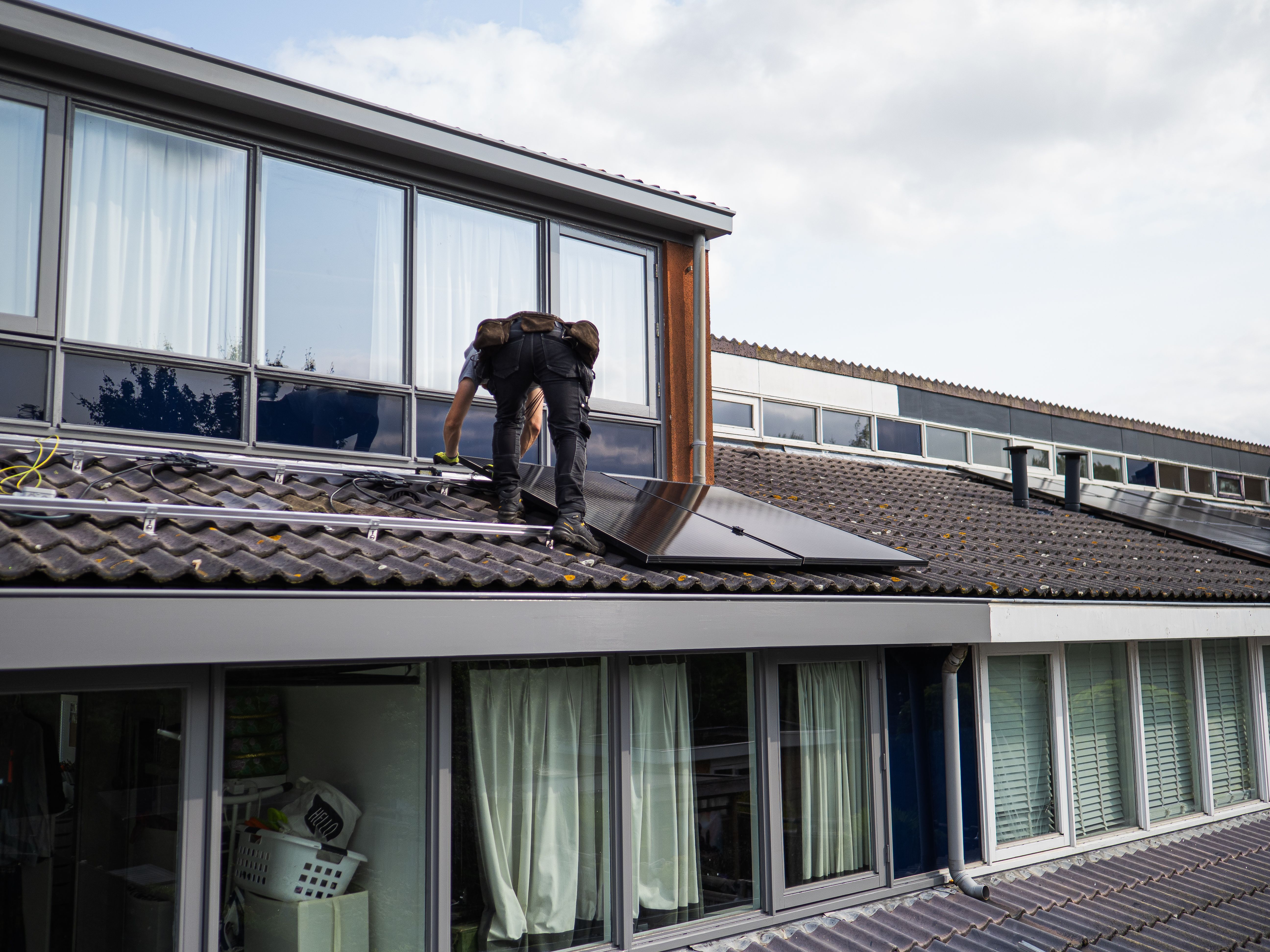 Dak Motion dakdekkers aan het werk